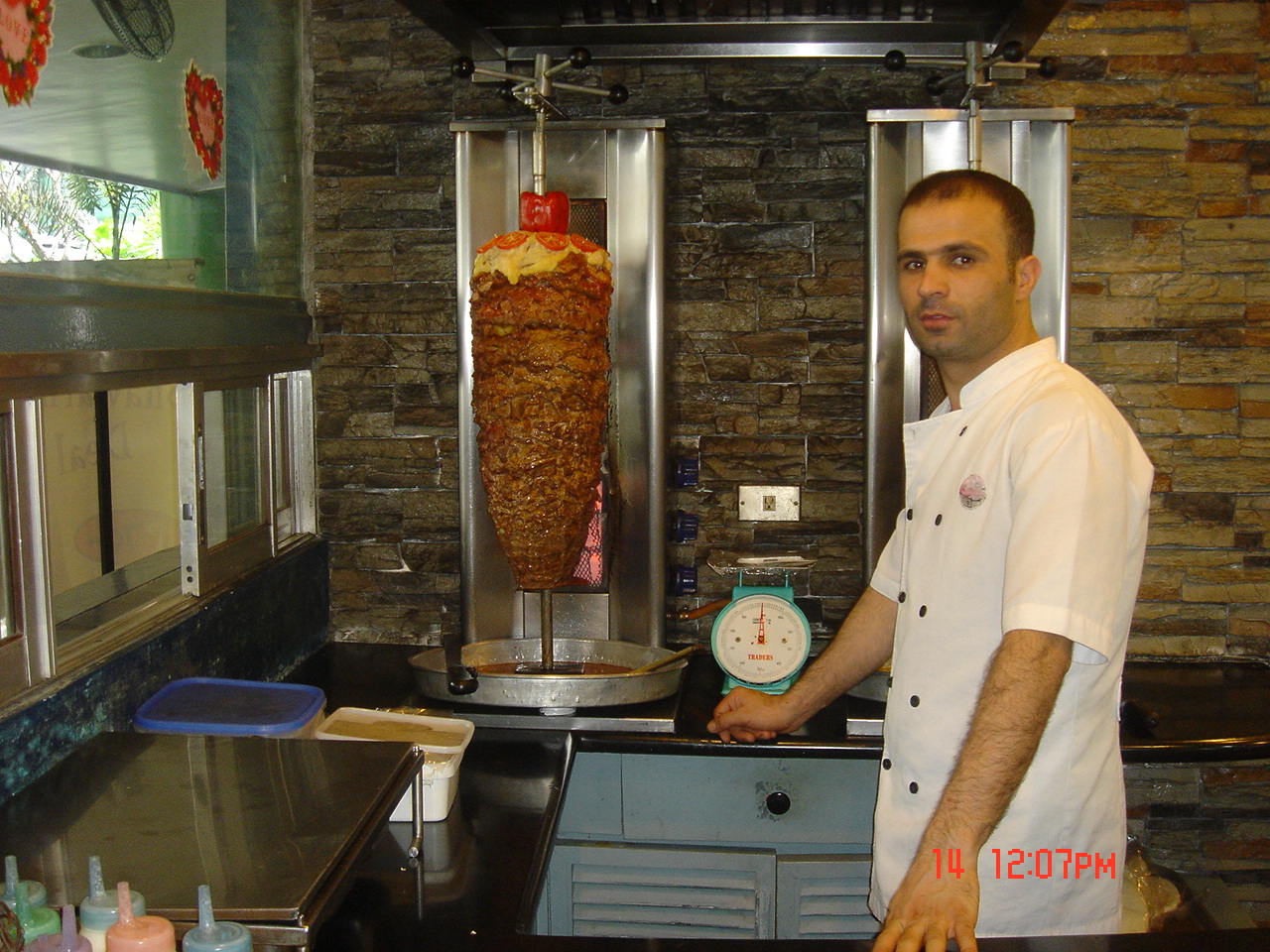 Young Rasim cooking in Istanbul kitchens